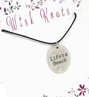 Life's A Beach Necklace. Stamped Pendant. Adjustable Black Cotton Cord.